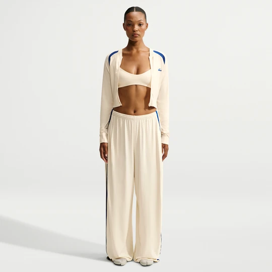 Zdjęcie produktu Damskie spodnie z szerokimi nogawkami NikeSKIMS Stretch Knit - Biel