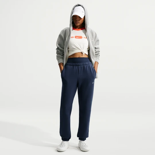 Zdjęcie produktu Damskie spodnie ze średnim stanem i mankietami Nike Studio Fleece Medium Weight - Niebieski