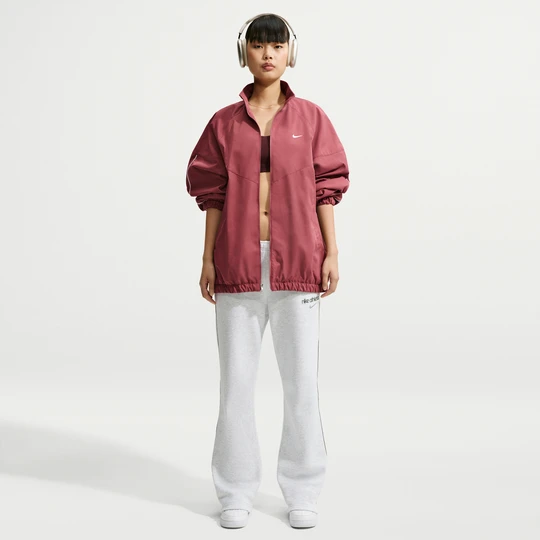 Zdjęcie produktu Damskie spodnie ze średnim stanem i rozciętym dołem Nike Studio Fleece Medium Weight - Brązowy