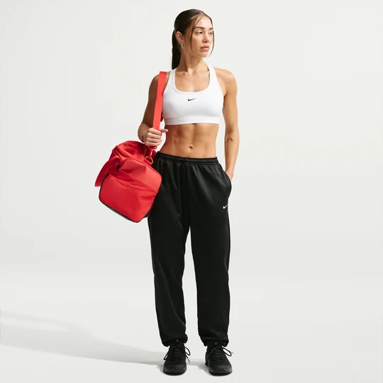 Zdjęcie produktu Damskie spodnie ze średnim stanem Therma-FIT Nike Studio Fleece Sport - Czerń