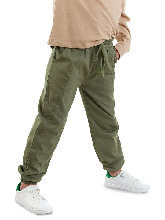 Zdjęcie produktu Denokids Spodnie w kolorze khaki rozmiar: 134