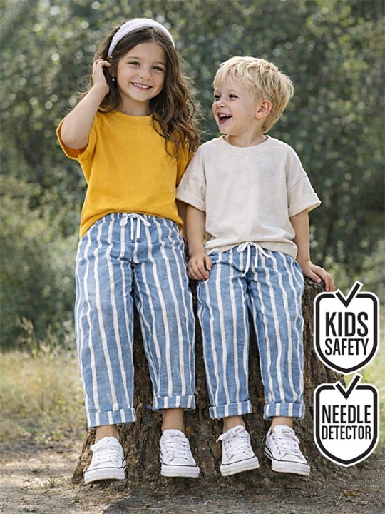 Zdjęcie produktu Denokids Spodnie w kolorze niebiesko-białym rozmiar: 128