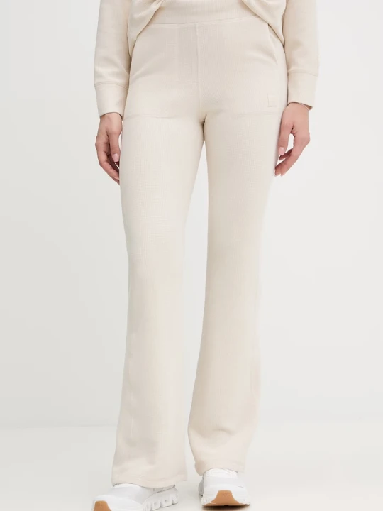 Zdjęcie produktu DKNY spodnie dresowe beżowy