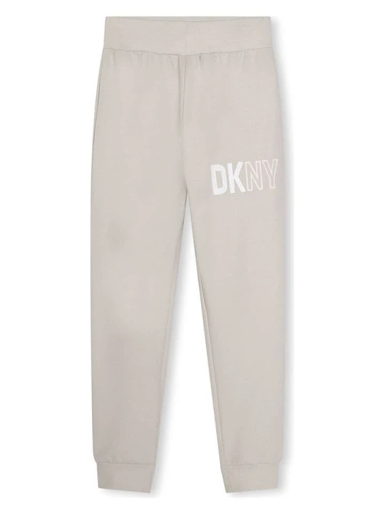 Zdjęcie produktu DKNY Spodnie dresowe w kolorze beżowym rozmiar: 140