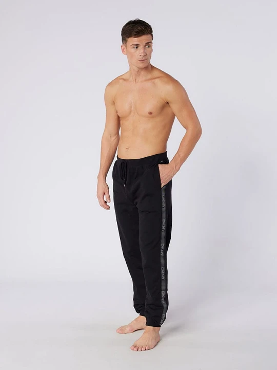 Zdjęcie produktu DKNY Spodnie dresowe w kolorze czarnym rozmiar: XL