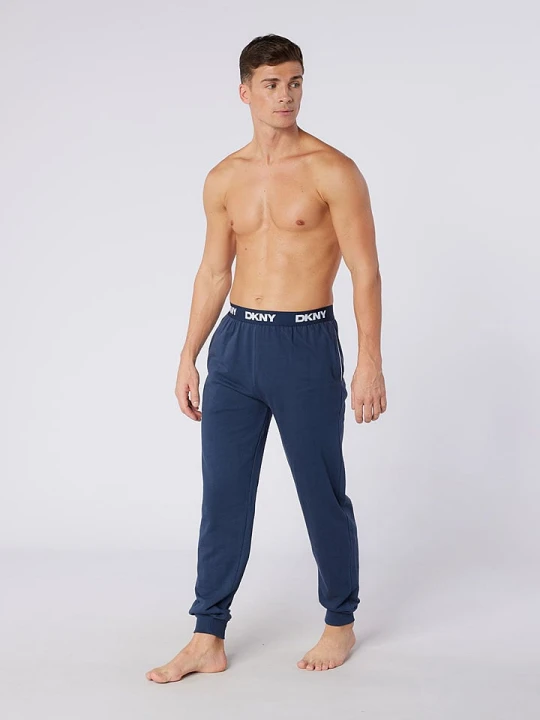 Zdjęcie produktu DKNY Spodnie dresowe w kolorze granatowym rozmiar: M