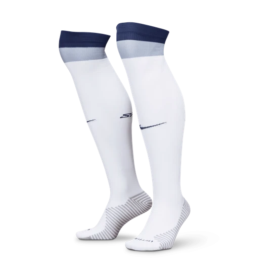 Zdjęcie produktu Długie skarpety piłkarskie Nike Dri-FIT Tottenham Hotspur Strike (wersja domowa) - Biel