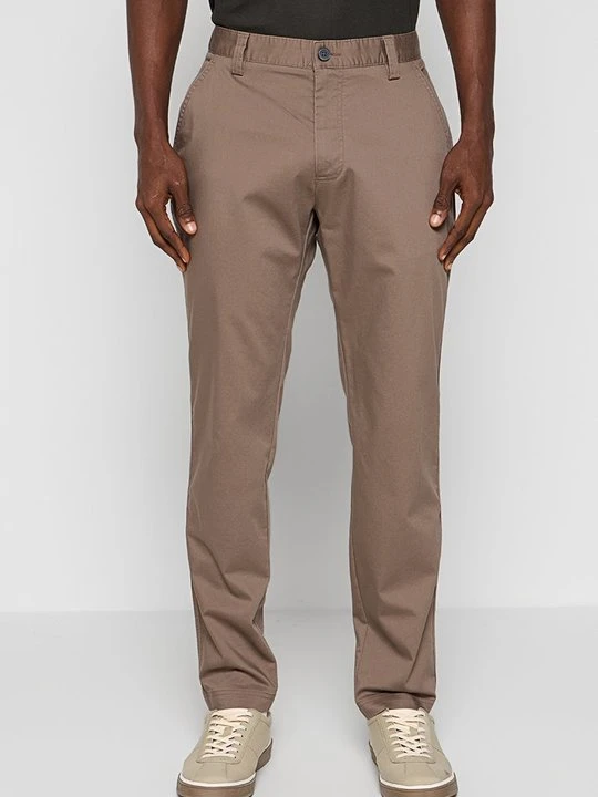 Zdjęcie produktu Długie spodnie trekkingowe Calvin Klein ciemnobrązowy
