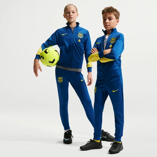 Zdjęcie produktu Dres piłkarski dla dużych dzieci Nike Dri-FIT FC Barcelona Strike (wersja czwarta) - Niebieski