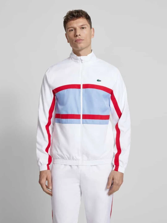 Zdjęcie produktu Dres w kroju regular fit z paskami w kontrastowym kolorze Lacoste