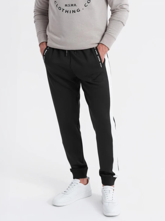 Zdjęcie produktu Dresowe męskie spodnie joggery z kontrastowymi lampasami – czarne V1 - Rozmiar: L Ombre Clothing
