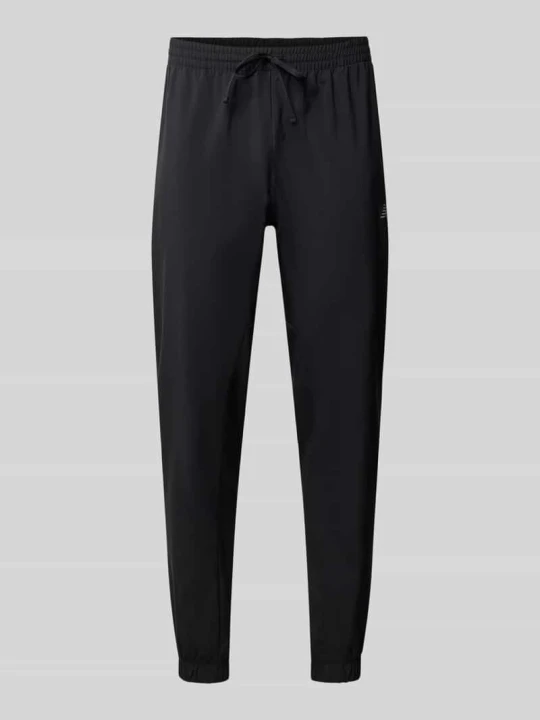Zdjęcie produktu Dresowe spodnie o kroju straight fit model 'ESSENTIALS' New Balance Czarny