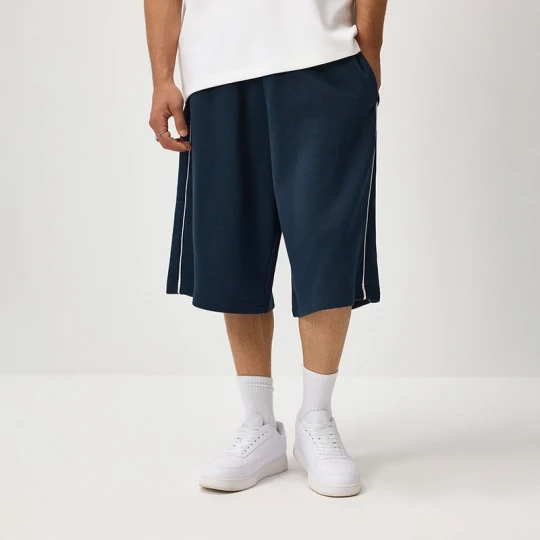 Zdjęcie produktu Dresowe szorty wide leg z lampasami granatowe House