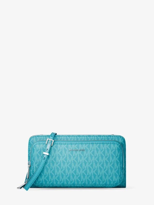 Zdjęcie produktu Duża podróżna torebka do przewieszenia przez ramię z charakterystycznym logo z kolekcji podróżnej Jet Set Michael Kors