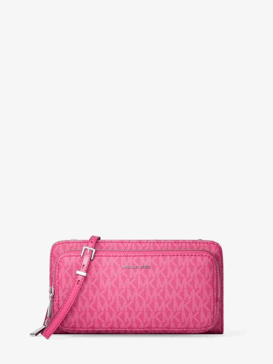 Zdjęcie produktu Duża podróżna torebka do przewieszenia przez ramię z charakterystycznym logo z kolekcji podróżnej Jet Set Michael Kors