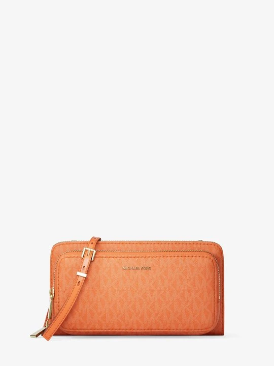 Zdjęcie produktu Duża podróżna torebka do przewieszenia przez ramię z charakterystycznym logo z kolekcji podróżnej Jet Set Michael Kors