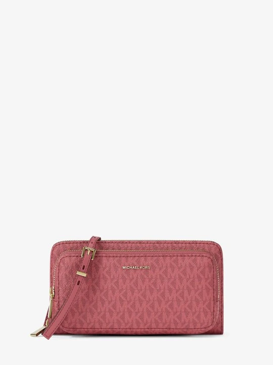 Zdjęcie produktu Duża torebka do przewieszenia przez ramię z charakterystycznym logo z kolekcji podróżnej Jet Set Michael Kors