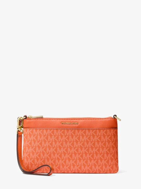 Zdjęcie produktu Duża torebka na nadgarstek Jet Set z charakterystycznym logo, zapięciem na zamek i odpinanym paskiem Michael Kors