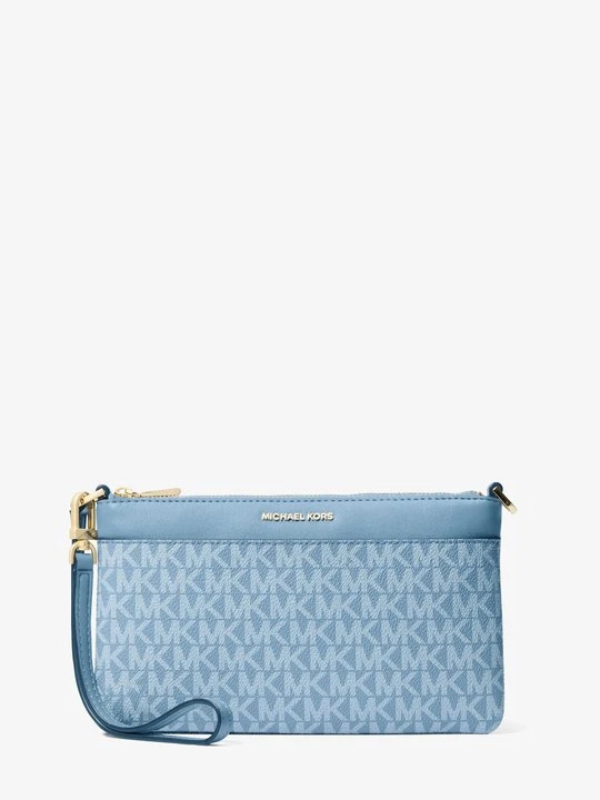 Zdjęcie produktu Duża torebka na nadgarstek Jet Set z charakterystycznym logo, zapięciem na zamek i odpinanym paskiem Michael Kors CHAMBRAY (Niebieski)