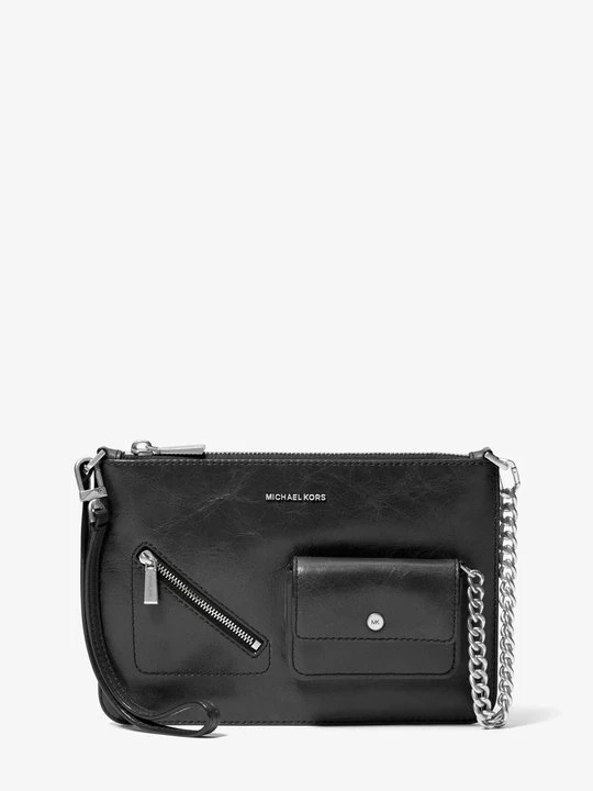 Zdjęcie produktu Duża torebka na nadgarstek Jet Set z zapięciem na zamek i odpinanym paskiem Michael Kors CZARNY (Czarny)