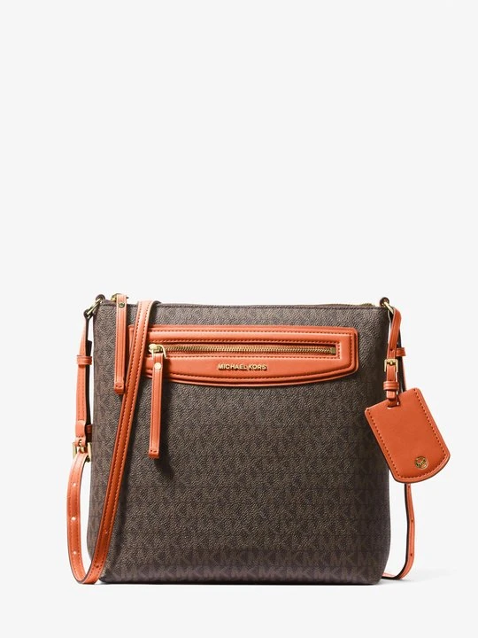 Zdjęcie produktu Duża torebka podróżna do przewieszenia przez ramię Jet Set z charakterystycznym logo Michael Kors