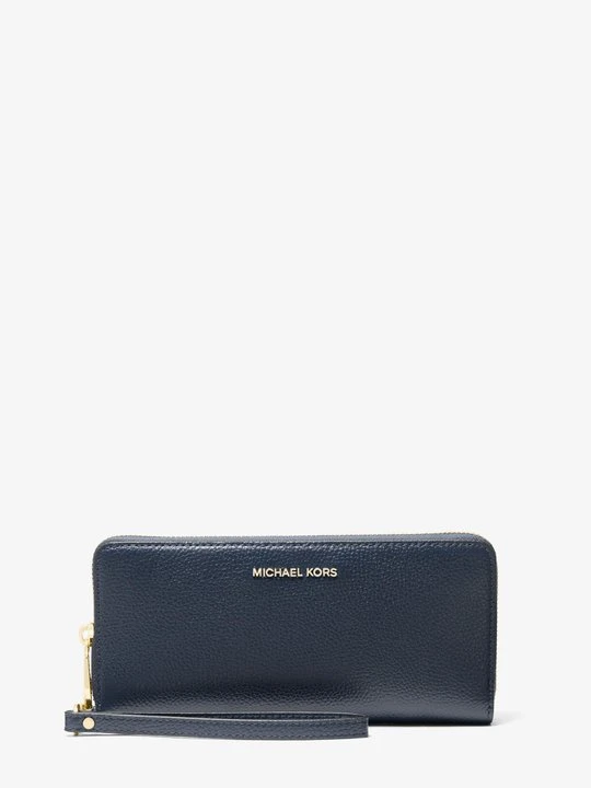 Zdjęcie produktu Duży podróżny portfel Jet Set ze skóry groszkowej Michael Kors GRANATOWY (Niebieski)
