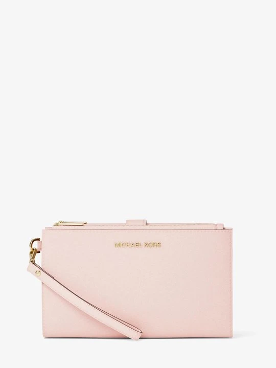Zdjęcie produktu Duży portfel na smartfona na nadgarstek Jet Set ze skóry Michael Kors RÓŻ DO POLICZKÓW (Różowy)