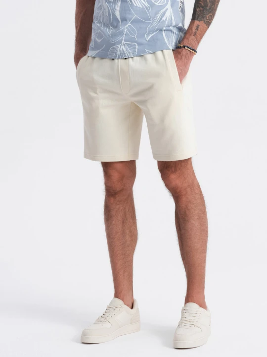 Zdjęcie produktu Dzianinowe spodenki męskie ze ściągaczem i kieszeniami - kremowe V12 - Rozmiar: XL Ombre Clothing kremowy