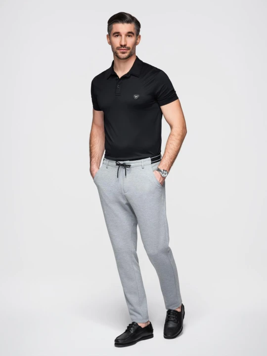 Zdjęcie produktu Dzianinowe spodnie męskie z gumką w pasie - jasnoszare V1 - Rozmiar: L Ombre Clothing szary
