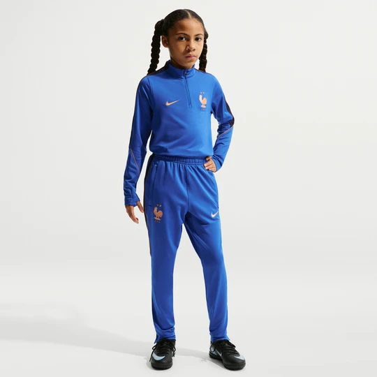 Zdjęcie produktu Dzianinowe spodnie piłkarskie dla dużych dzieci Nike Dri-FIT FFF Strike - Niebieski