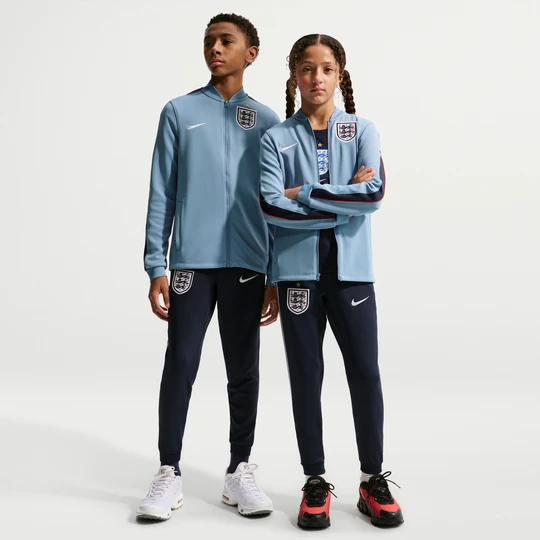 Zdjęcie produktu Dzianinowy dres piłkarski dla dużych dzieci Nike Dri-FIT Anglia Strike - Niebieski