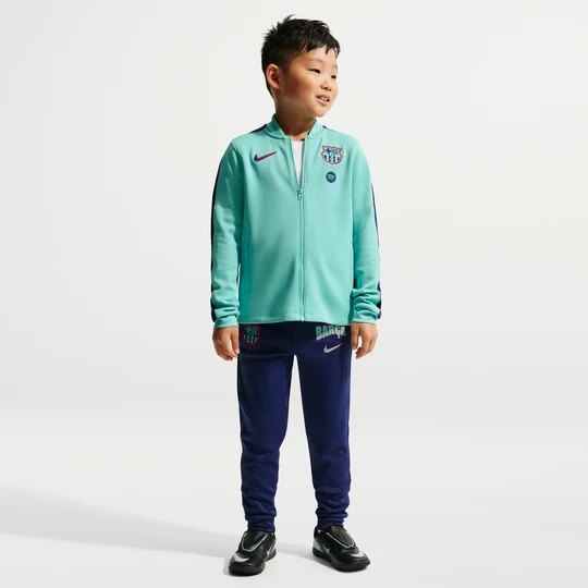 Zdjęcie produktu Dzianinowy dres piłkarski dla małych dzieci Nike Dri-FIT FC Barcelona Strike (wersja trzecia) - Zieleń