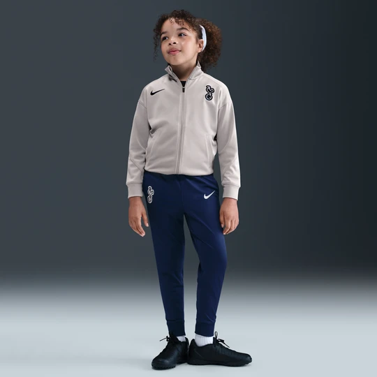 Zdjęcie produktu Dzianinowy dres piłkarski dla małych dzieci Nike Dri-FIT Tottenham Hotspur Strike - Szary