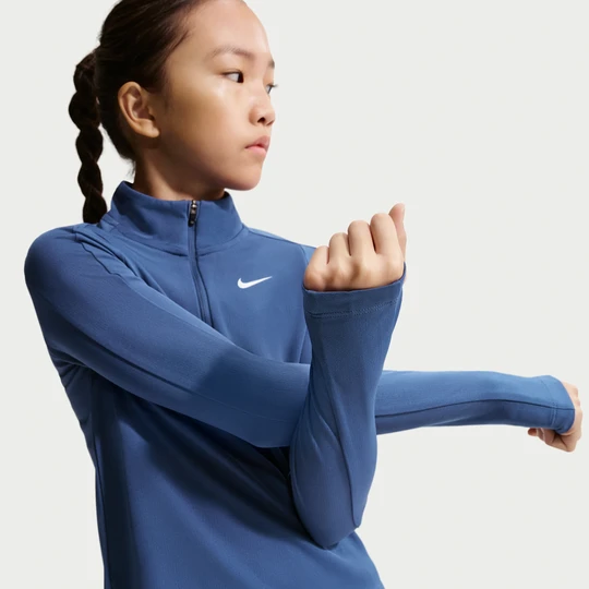 Zdjęcie produktu Dziewczęca koszulka z długim rękawem i zamkiem 1/4 Dri-FIT Nike - Niebieski