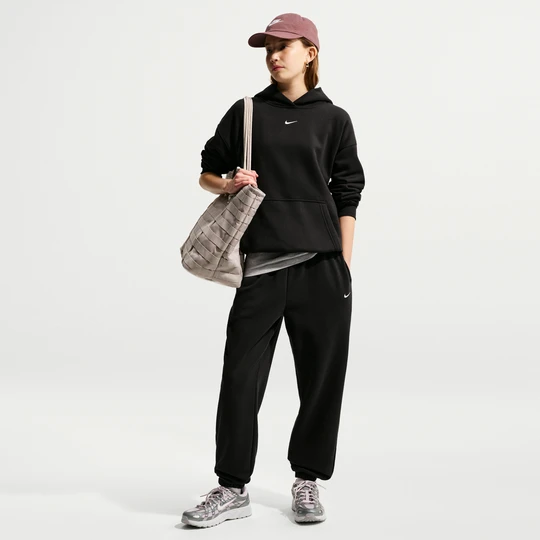 Zdjęcie produktu Dziewczęce spodnie o luźnym kroju Nike Studio Fleece - Czerń