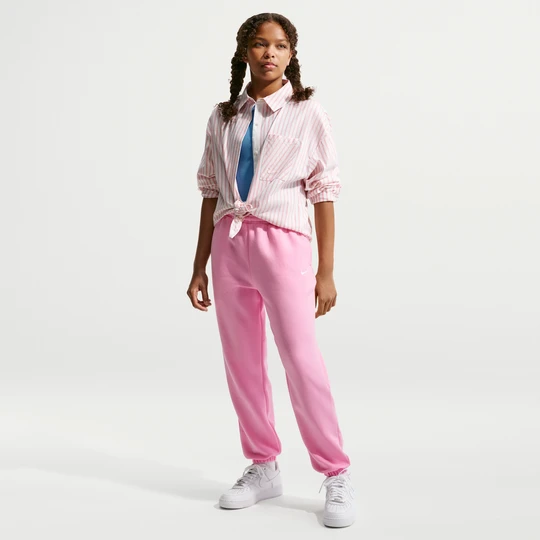 Zdjęcie produktu Dziewczęce spodnie o luźnym kroju Nike Studio Fleece - Różowy
