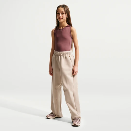 Zdjęcie produktu Dziewczęce spodnie z wysokim stanem z dzianiny Nike MAVN Therma-FIT - Brązowy