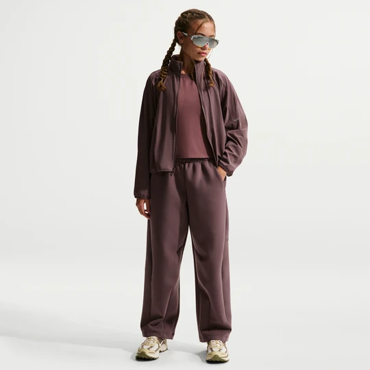 Zdjęcie produktu Dziewczęce spodnie z wysokim stanem z dzianiny Nike MAVN Therma-FIT - Fiolet