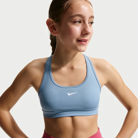 Zdjęcie produktu Dziewczęcy stanik sportowy Nike Swoosh - Niebieski