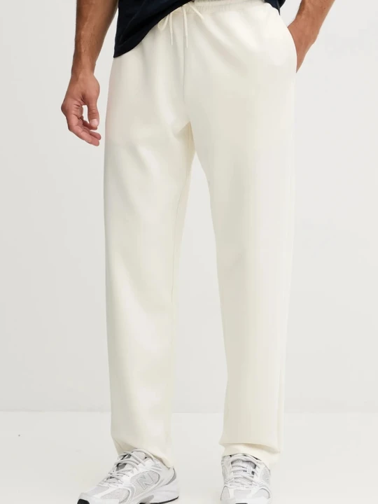 Zdjęcie produktu EA7 Emporio Armani spodnie dresowe beżowy