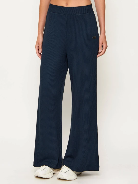 Zdjęcie produktu EA7 Spodnie dresowe | flare fit granatowy