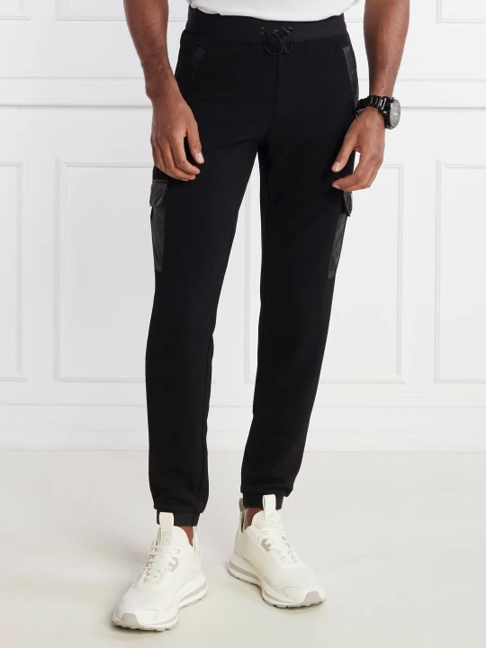 Zdjęcie produktu EA7 Spodnie dresowe | Regular Fit czarny