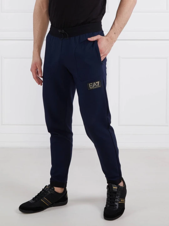 Zdjęcie produktu EA7 Spodnie dresowe | Regular Fit granatowy