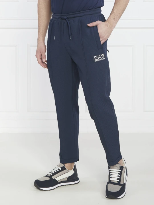 Zdjęcie produktu EA7 Spodnie dresowe | Regular Fit granatowy