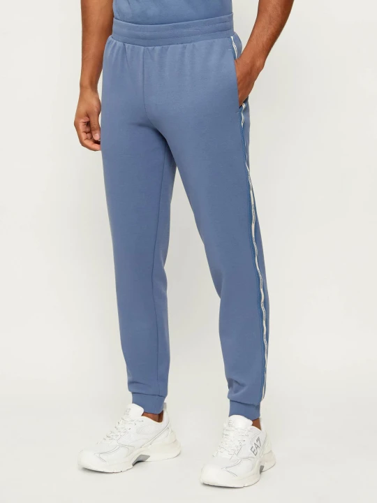 Zdjęcie produktu EA7 Spodnie dresowe | Slim Fit niebieski
