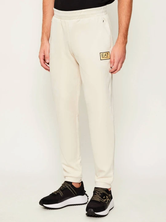 Zdjęcie produktu EA7 Spodnie dresowe | Slim Fit ecru