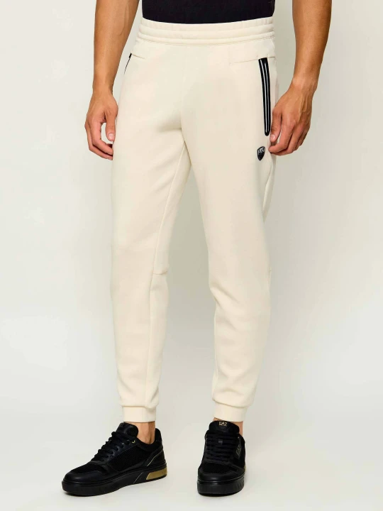 Zdjęcie produktu EA7 Spodnie dresowe | Slim Fit kremowy