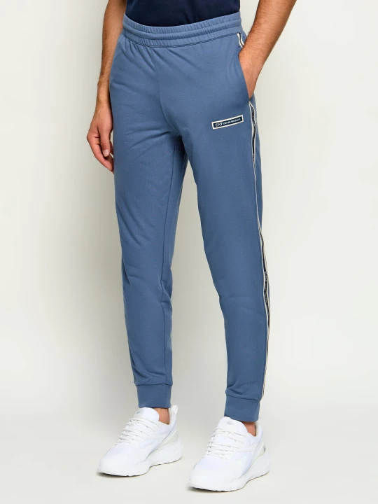 Zdjęcie produktu EA7 Spodnie dresowe | Slim Fit niebieski