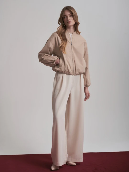 Zdjęcie produktu Eleganckie spodnie z szeroką nogawką Greenpoint kremowy