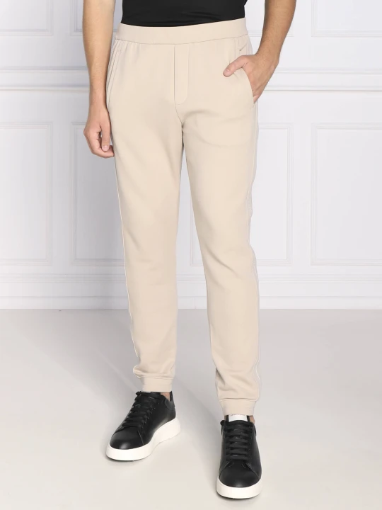 Zdjęcie produktu Emporio Armani Spodnie dresowe | Regular Fit beżowy